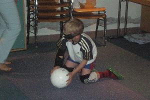 Bild: ein junger Mann mit dem Ball
